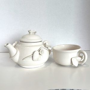 Vintage teapot with teacup